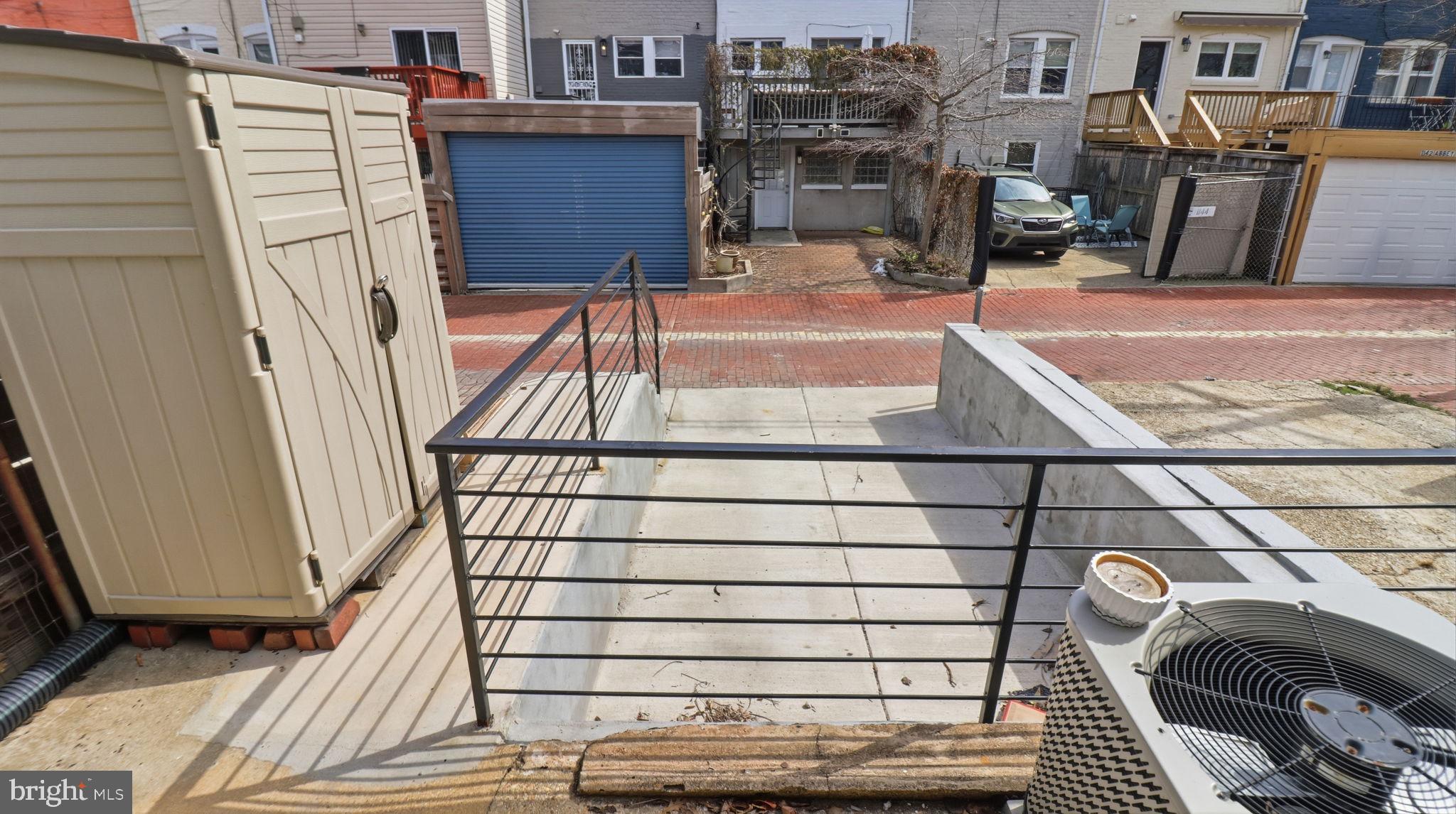 1153 3rd Street Northeast Washington, DC 20002 - Photo 33 of 38 Back Parking Pad