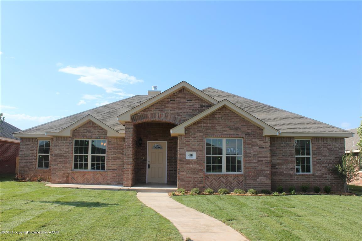 front view of a house and a yard
