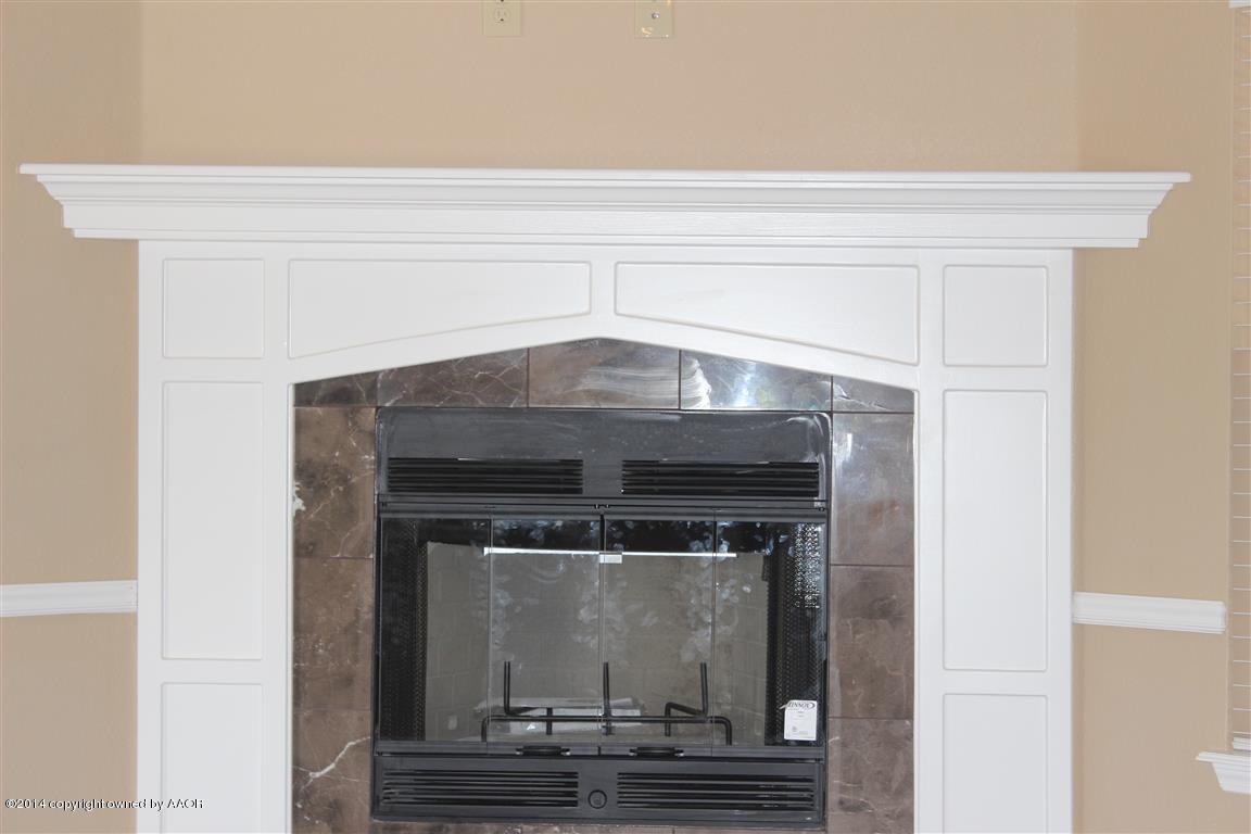 3910 Arden Road Amarillo, TX 79118 - Photo 4 of 15 a view of fireplace and utility room