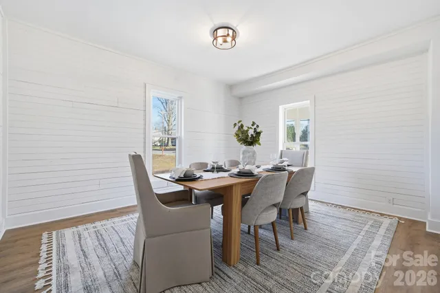 a bathroom with a shower and a sink