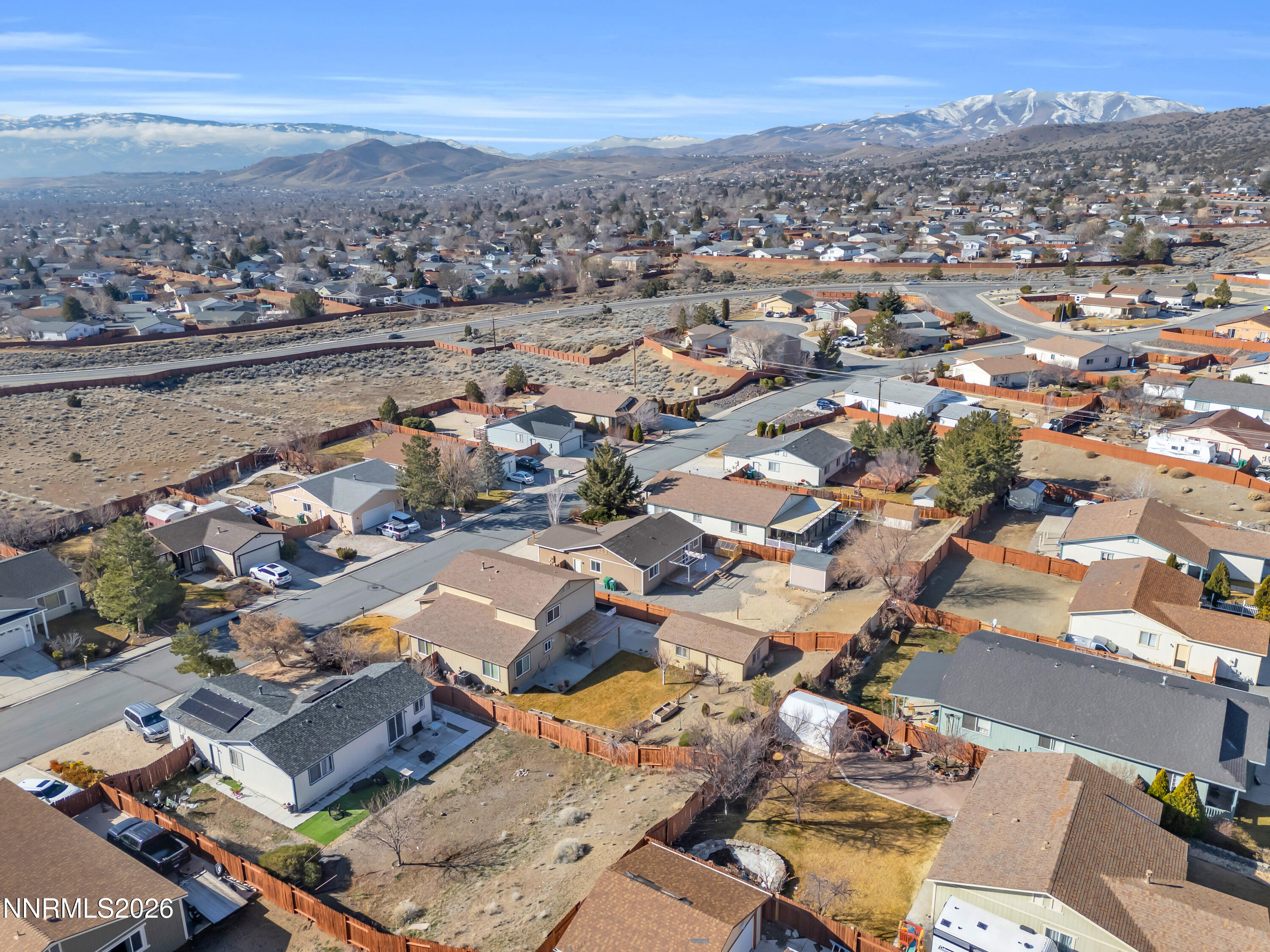 7295 Raphael Drive Sun Valley, NV 89433 - Photo 13 of 44 an aerial view of a city with lots of residential buildings