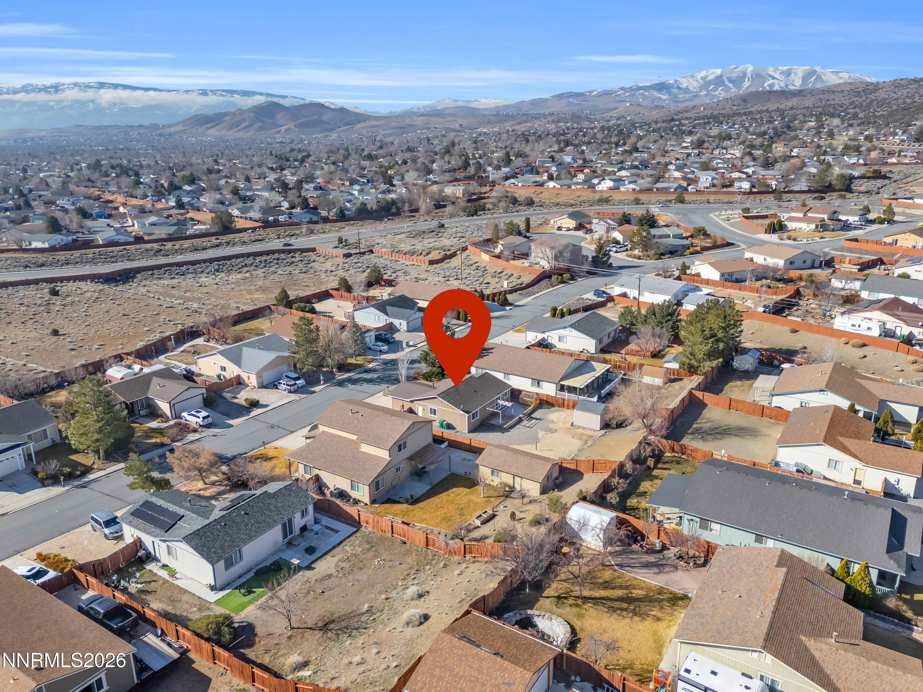 7295 Raphael Drive Sun Valley, NV 89433 - Photo 14 of 44 an aerial view of a city with lots of residential buildings