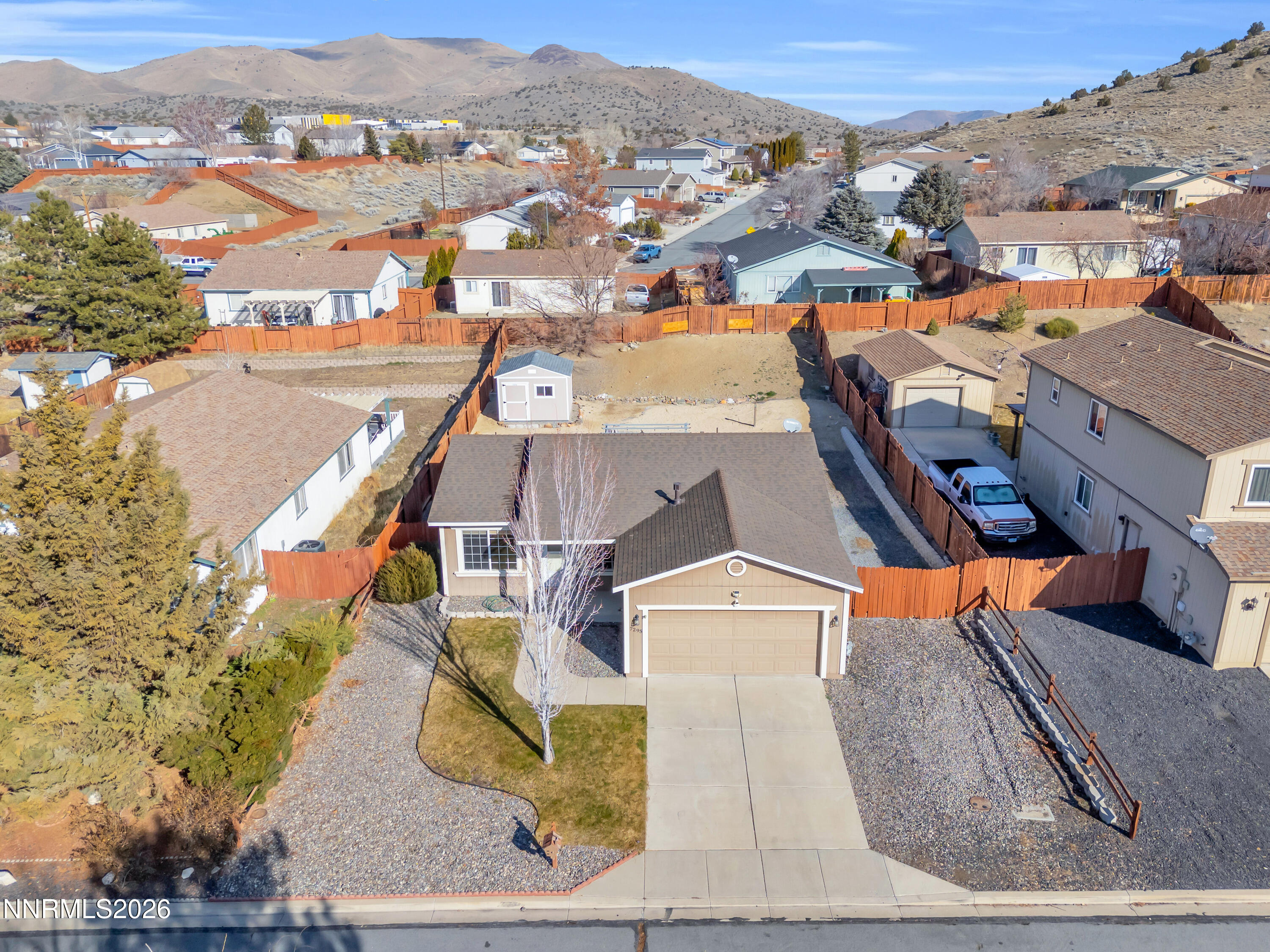 7295 Raphael Drive Sun Valley, NV 89433 - Photo 2 of 44 an aerial view of a city