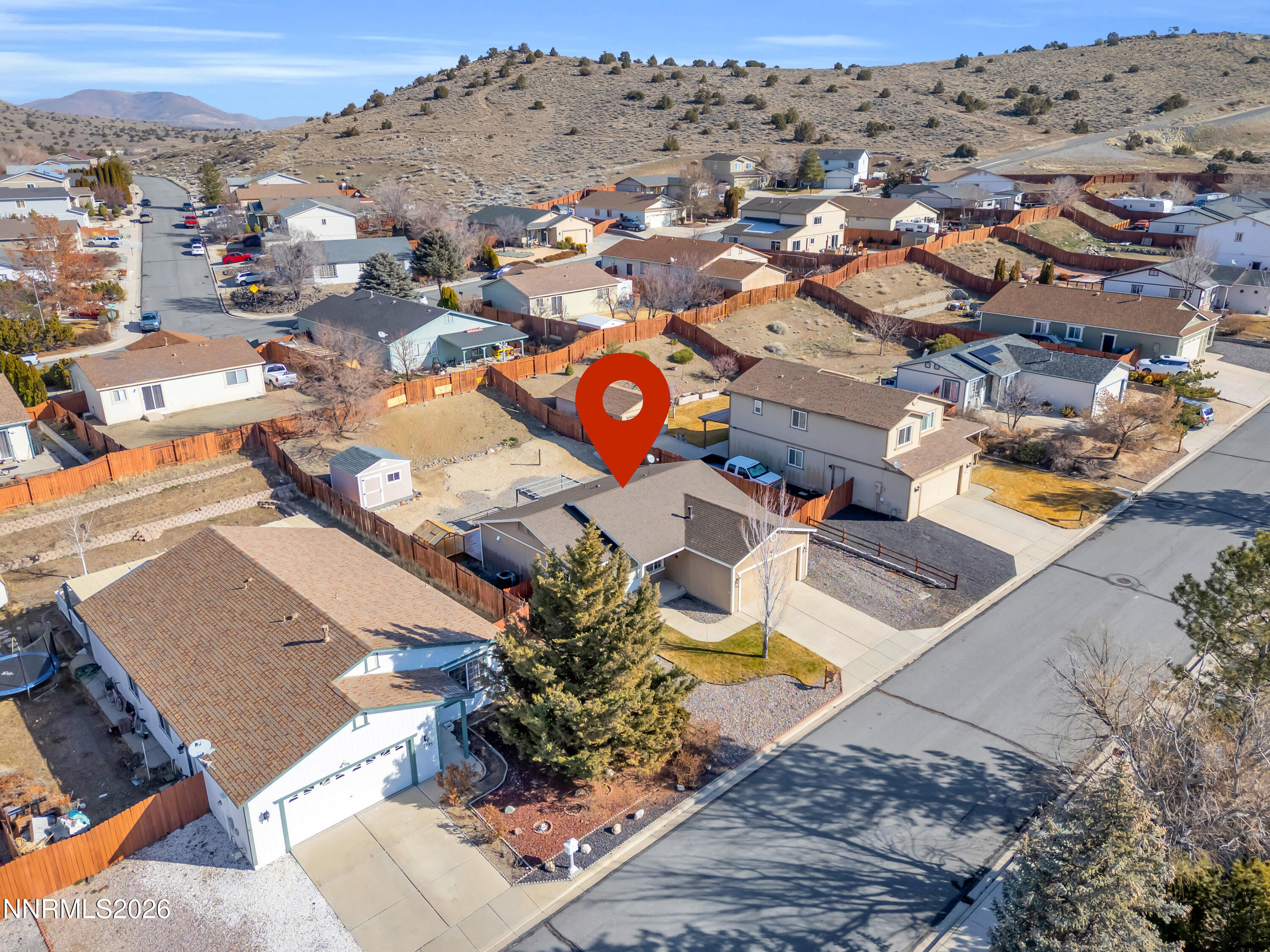 7295 Raphael Drive Sun Valley, NV 89433 - Photo 4 of 44 an aerial view of residential houses with outdoor space