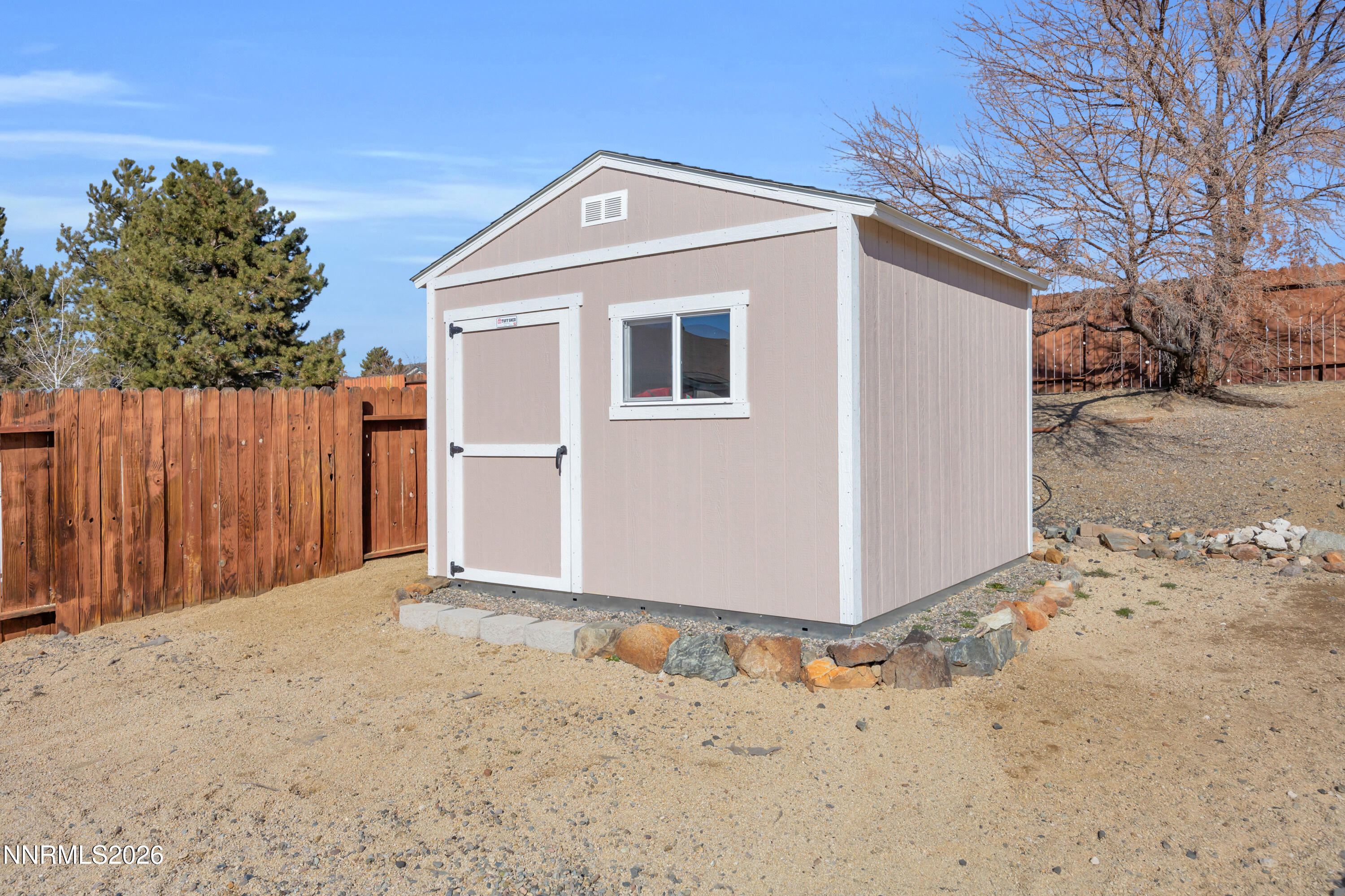 7295 Raphael Drive Sun Valley, NV 89433 - Photo 43 of 44 a view of a small space with wooden fence