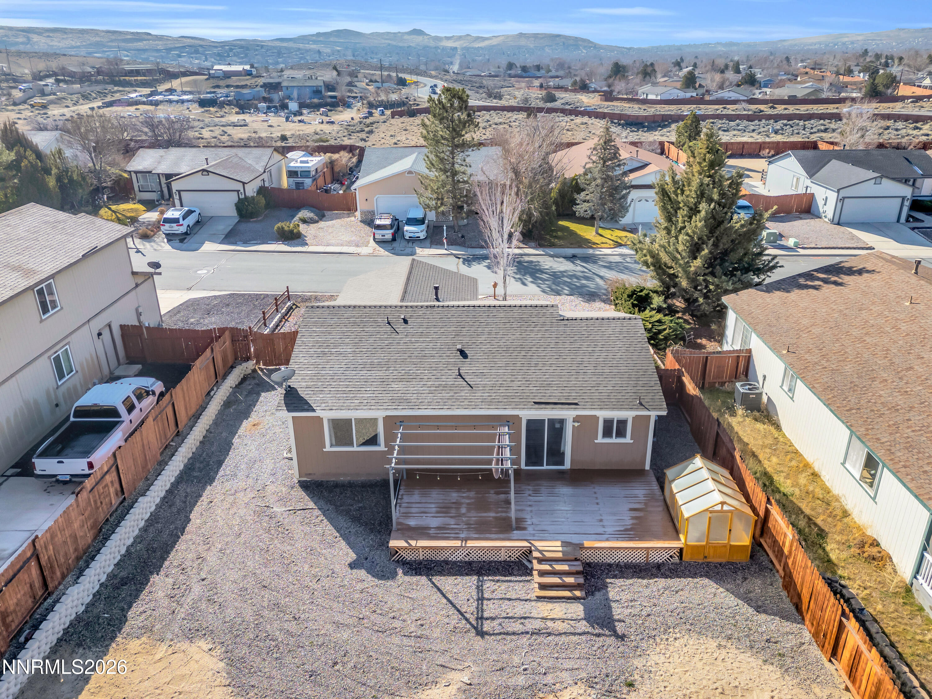 7295 Raphael Drive Sun Valley, NV 89433 - Photo 8 of 44 an aerial view of a house with a yard