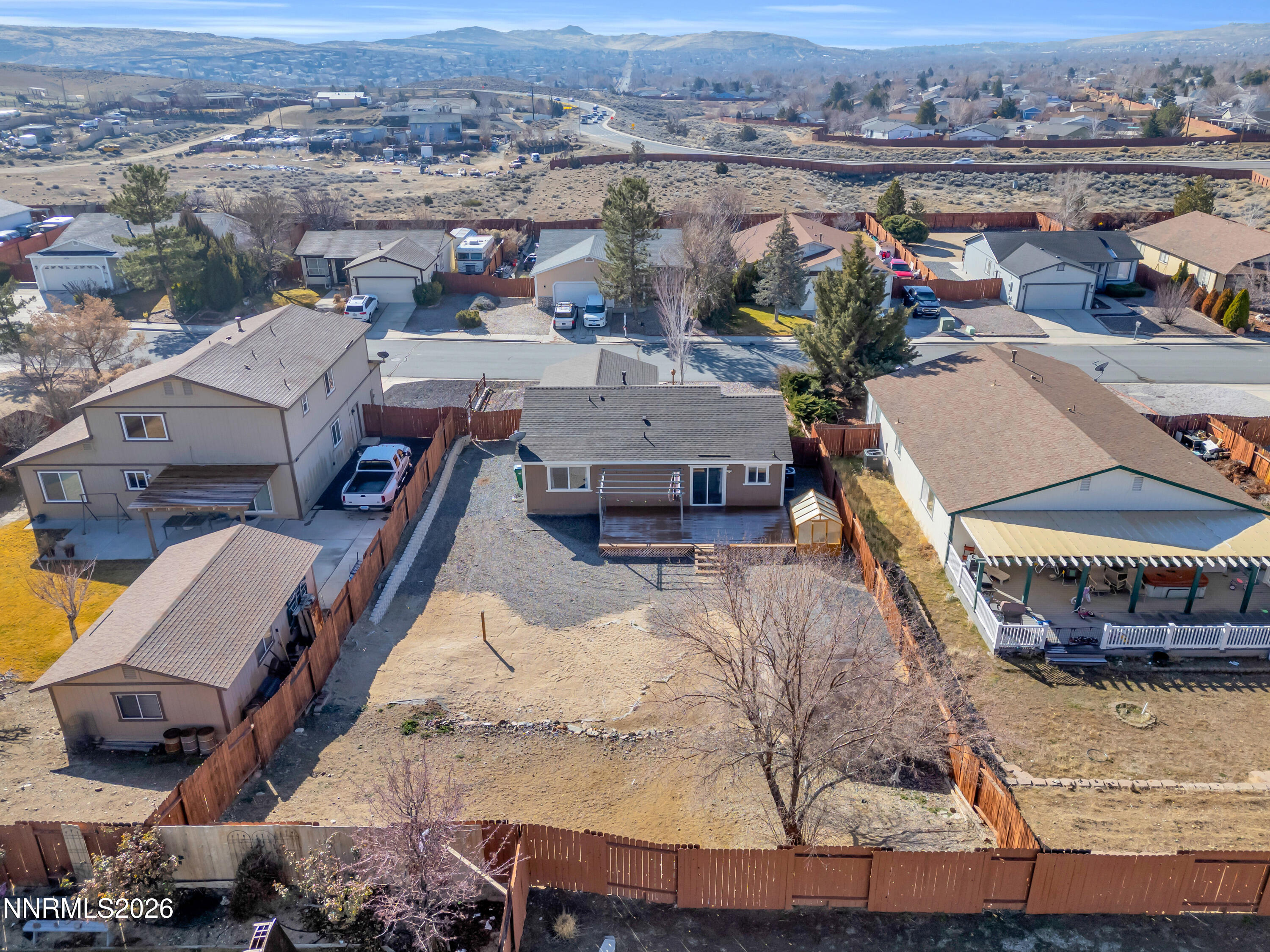 7295 Raphael Drive Sun Valley, NV 89433 - Photo 9 of 44 an aerial view of a house with a yard lake view and mountain view
