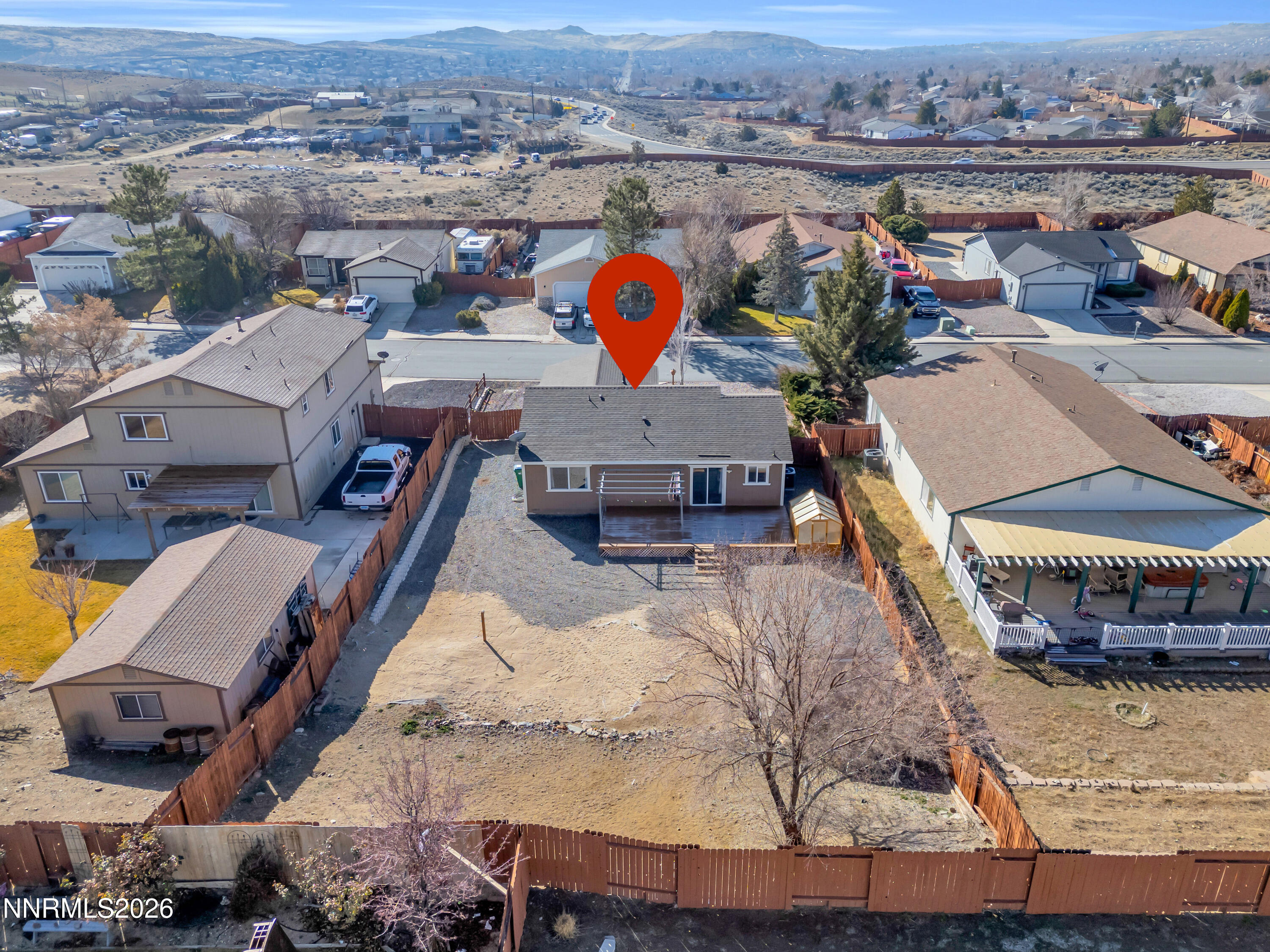 7295 Raphael Drive Sun Valley, NV 89433 - Photo 10 of 44 an aerial view of a house with yard swimming pool and ocean view
