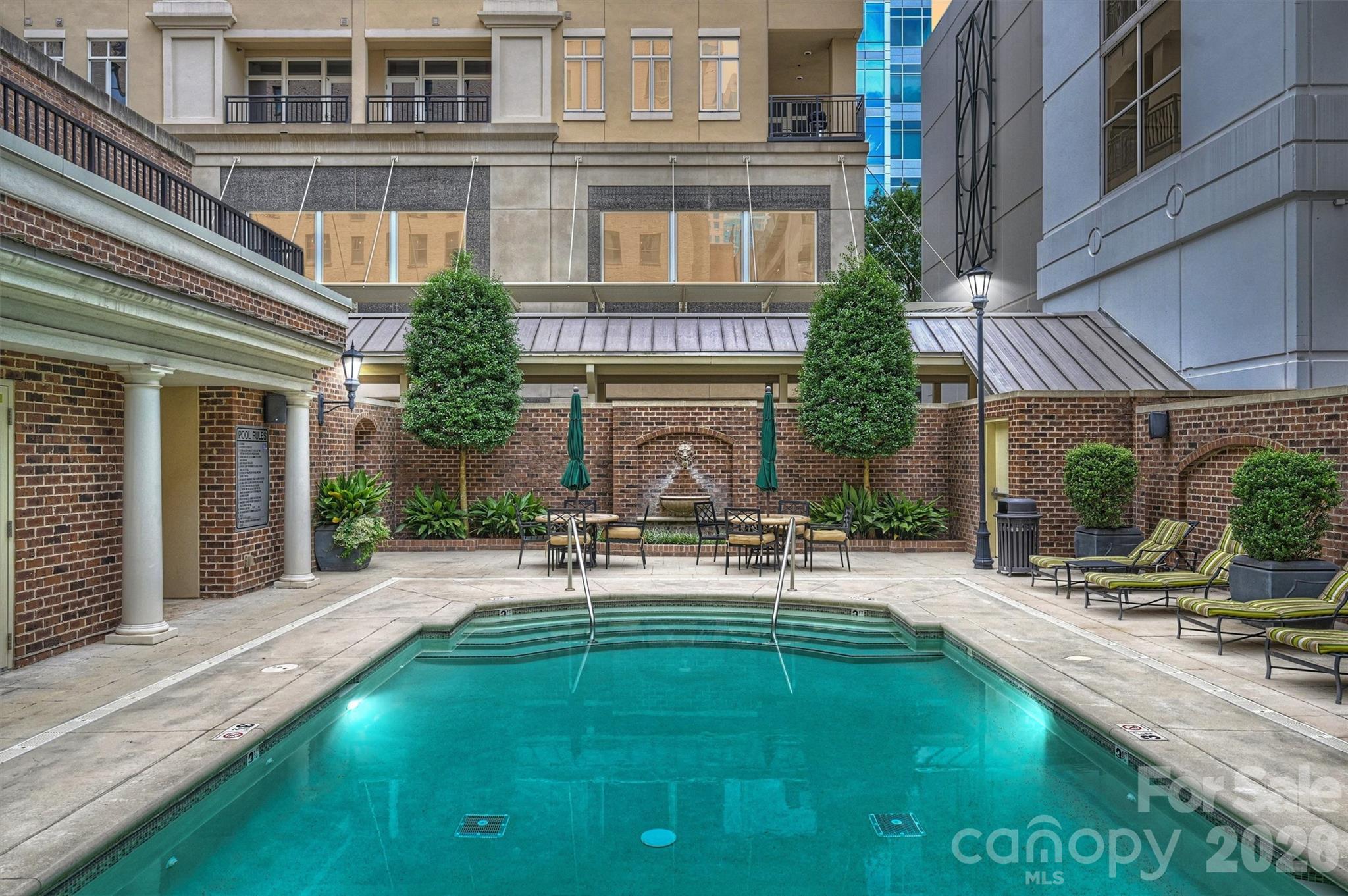 230 South Tryon Street, Unit 908 Charlotte, NC 28281 - Photo 29 of 31 a house view with outdoor seating space and garden view