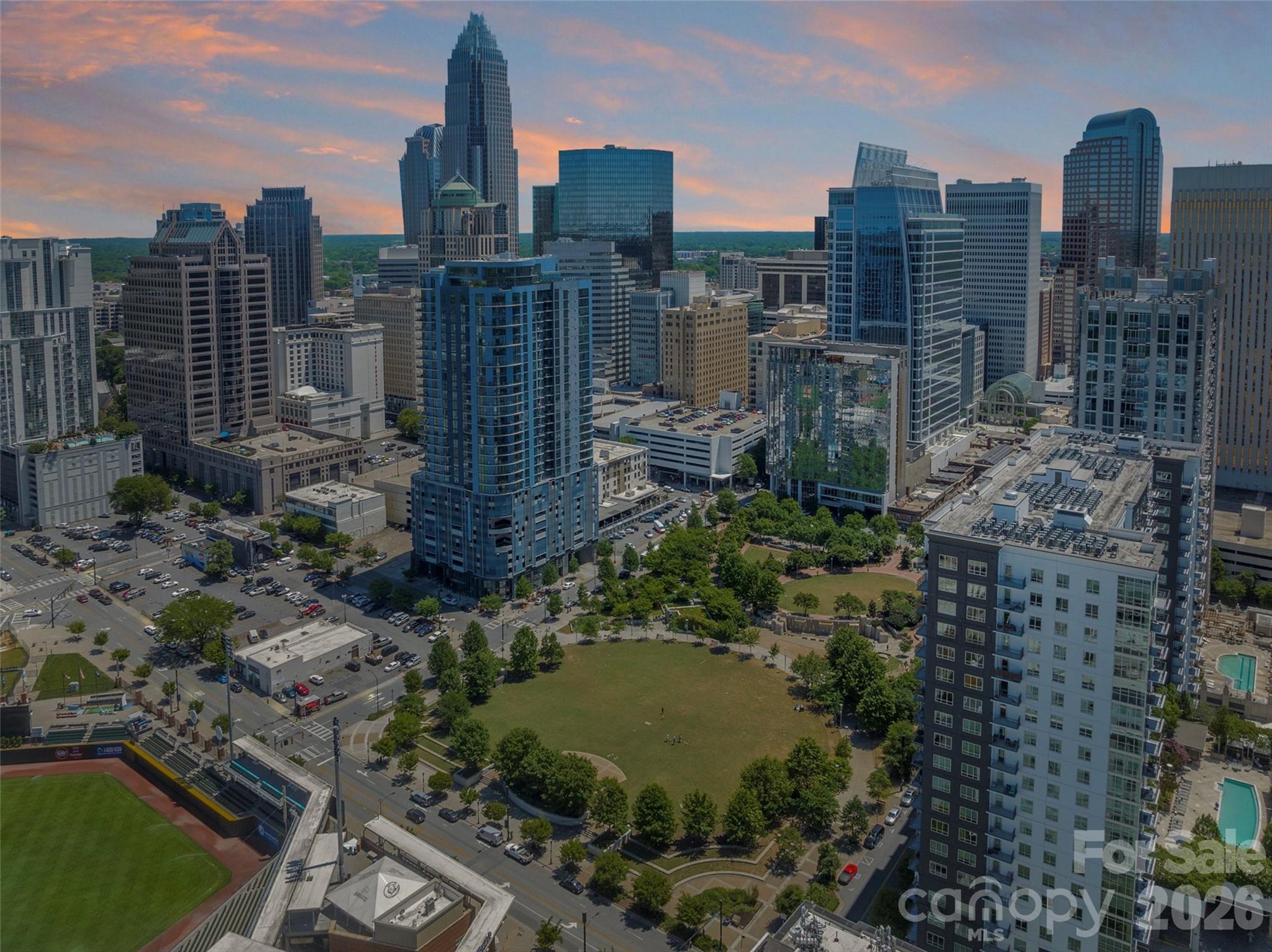 230 South Tryon Street, Unit 908 Charlotte, NC 28281 - Photo 31 of 31 a view of a city with tall buildings