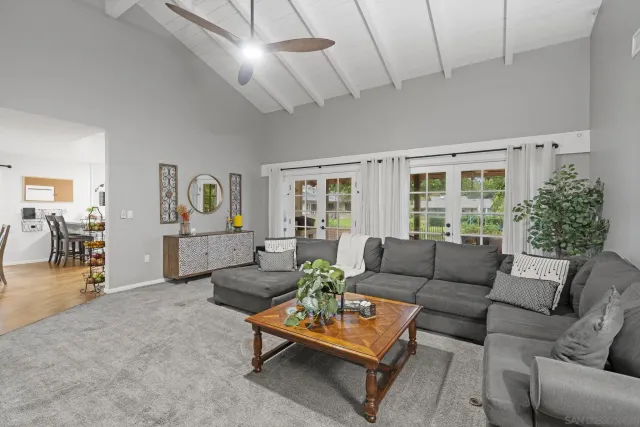 a living room with furniture and a table