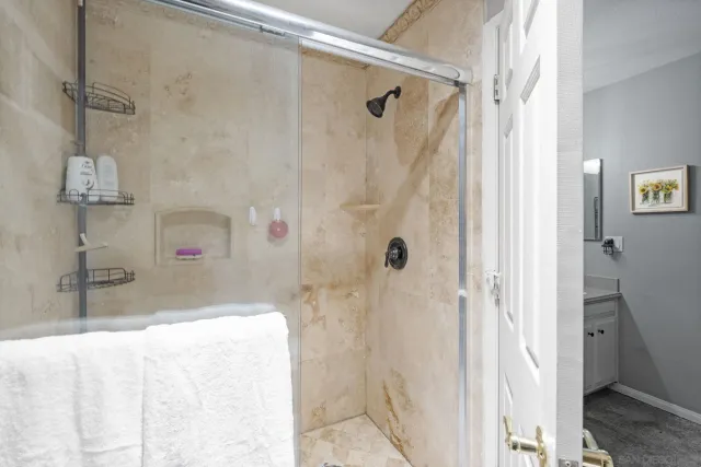 a bathroom with a sink and a shower