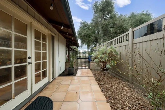 a view of a swimming pool with a yard