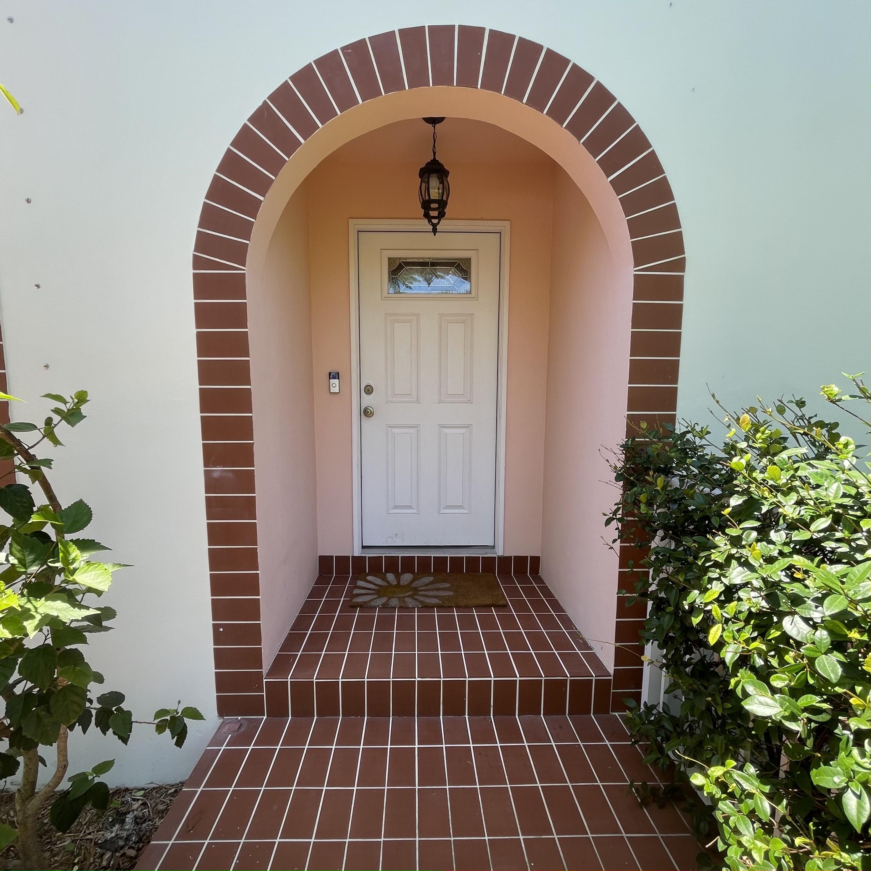 470 Mars Way Juno Beach, FL 33408 - Photo 3 of 18 Front Entrance