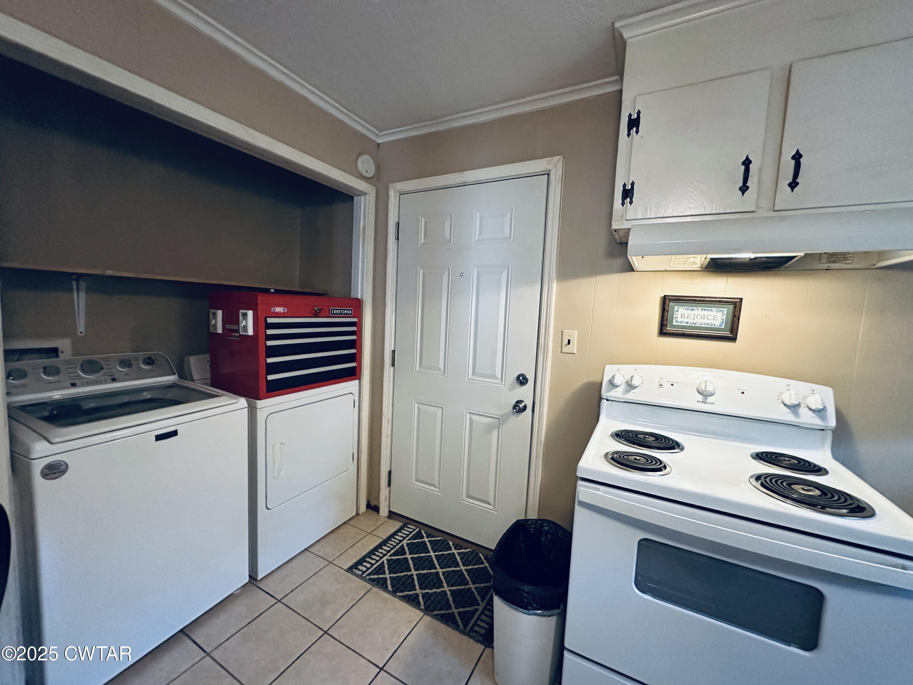 112 Fox Street Rutherford, TN 38369 - Photo 11 of 14 a kitchen with white cabinets and white appliances