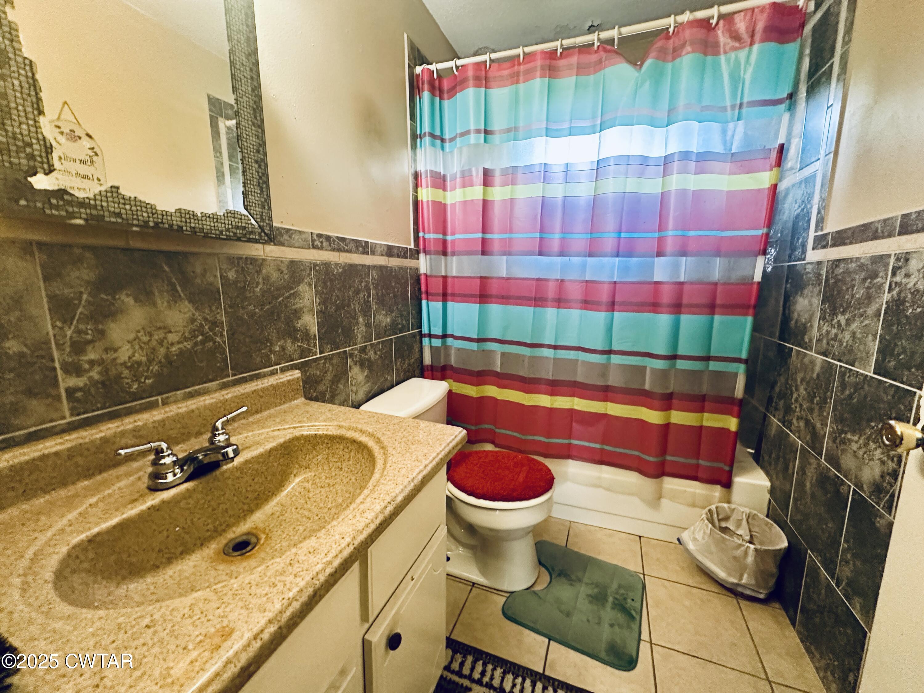 112 Fox Street Rutherford, TN 38369 - Photo 14 of 14 a bathroom with a sink and toilet