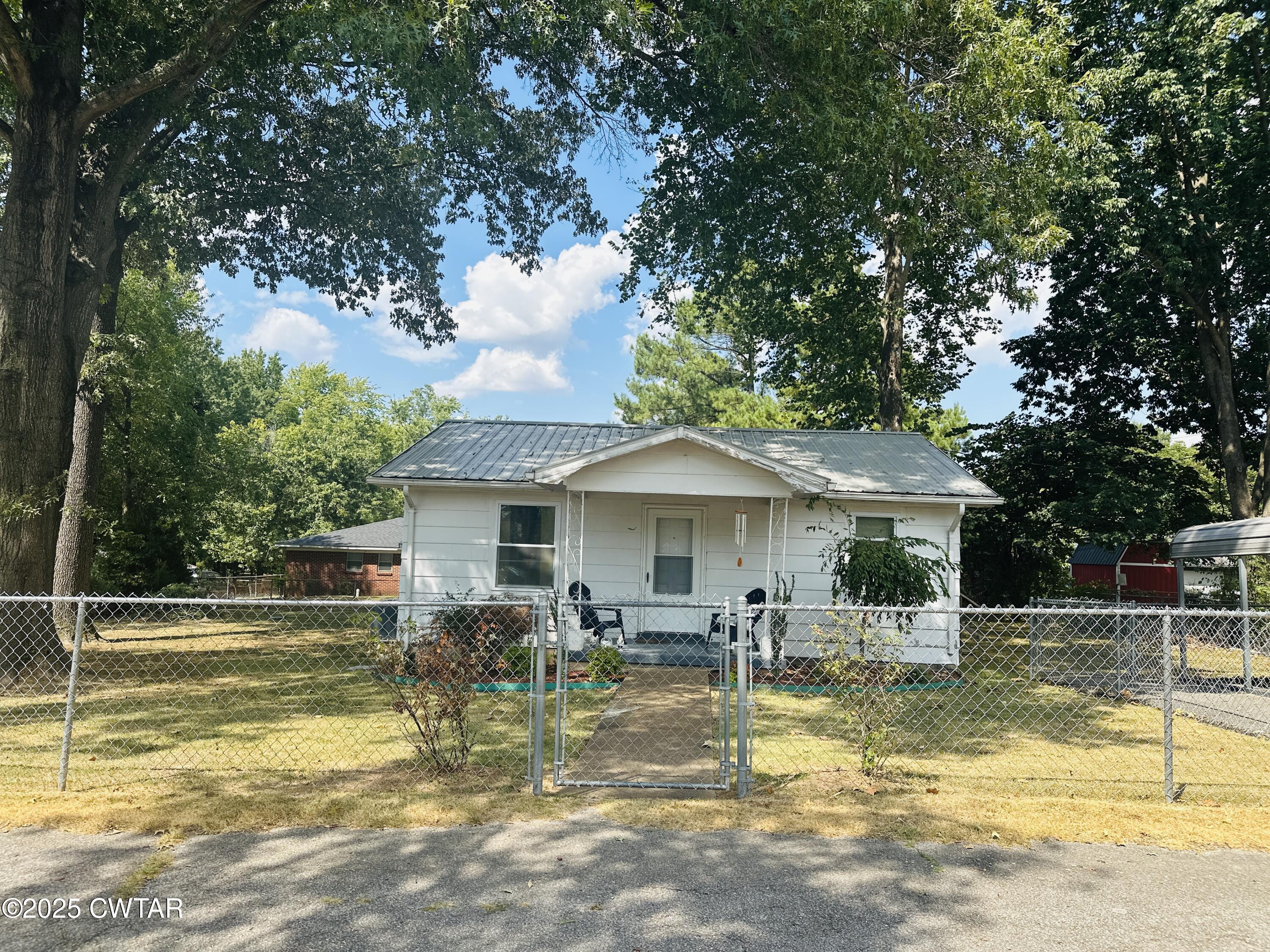 112 Fox Street Rutherford, TN 38369 - Photo 2 of 14 a view of a house with swimming pool and a yard