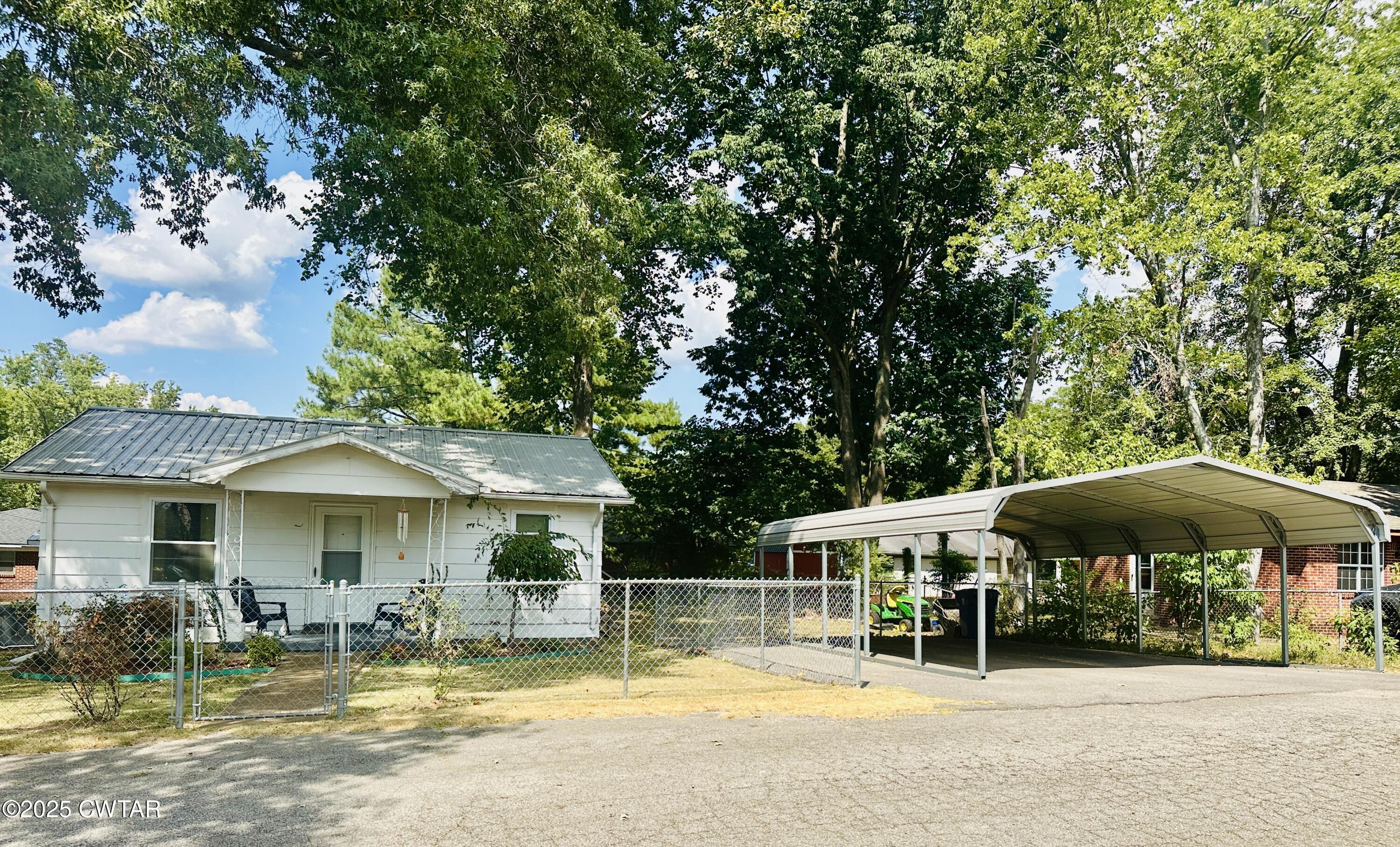 112 Fox Street Rutherford, TN 38369 - Photo 3 of 14 a view of a house with swimming pool and sitting area