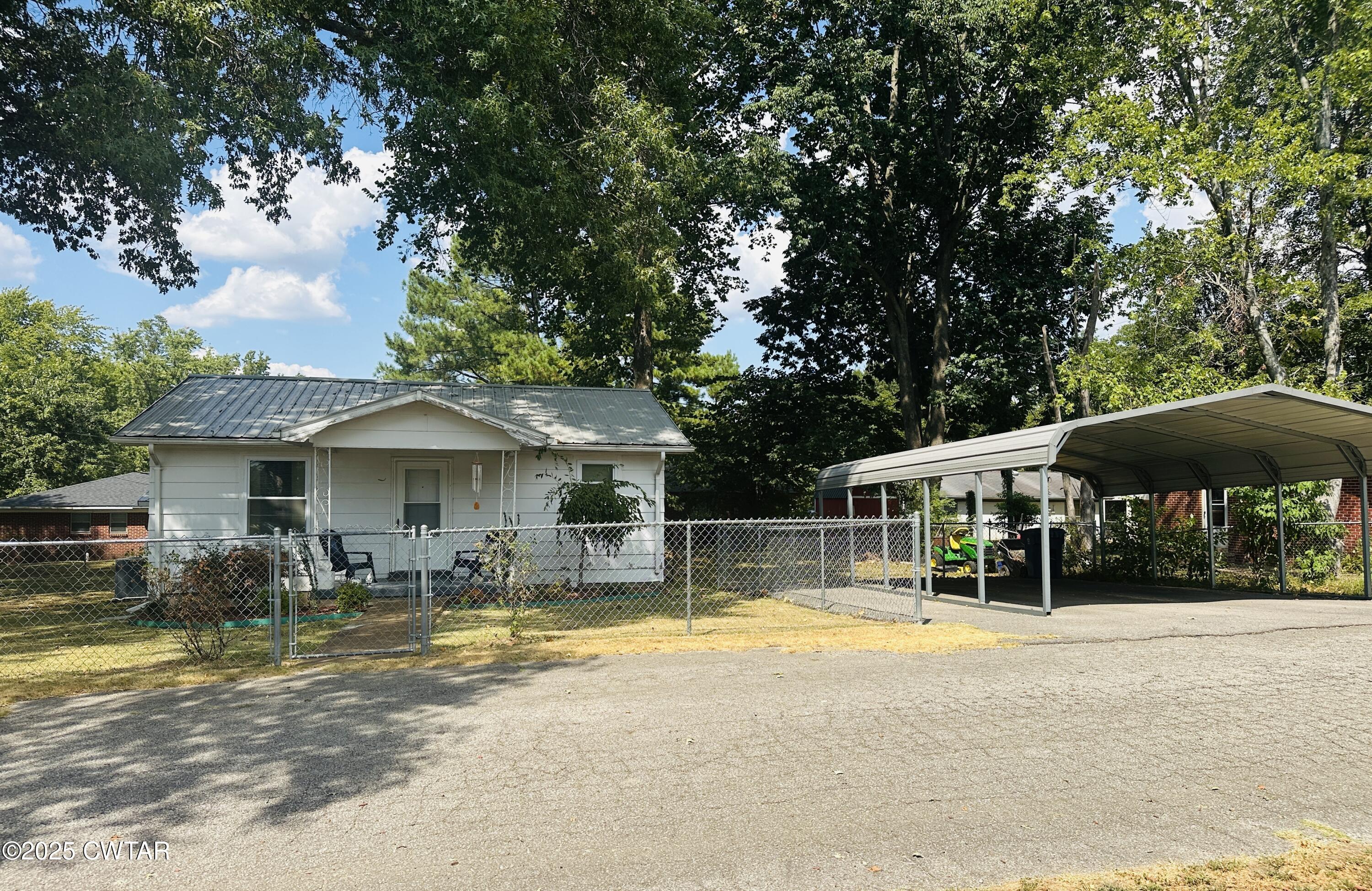 112 Fox Street Rutherford, TN 38369 - Photo 4 of 14 a view of a house with swimming pool and sitting area