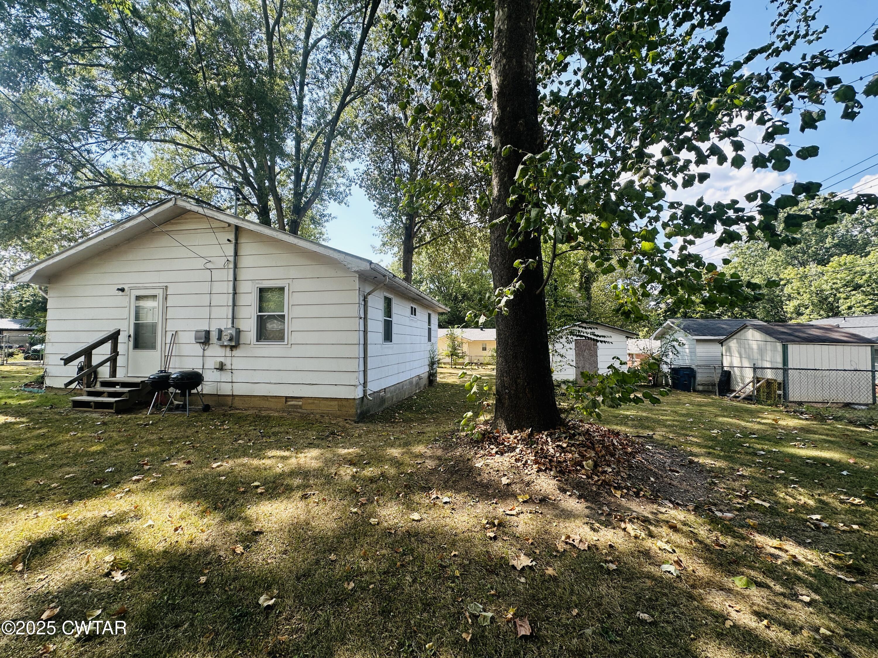 112 Fox Street Rutherford, TN 38369 - Photo 6 of 14 a view of a house with a yard