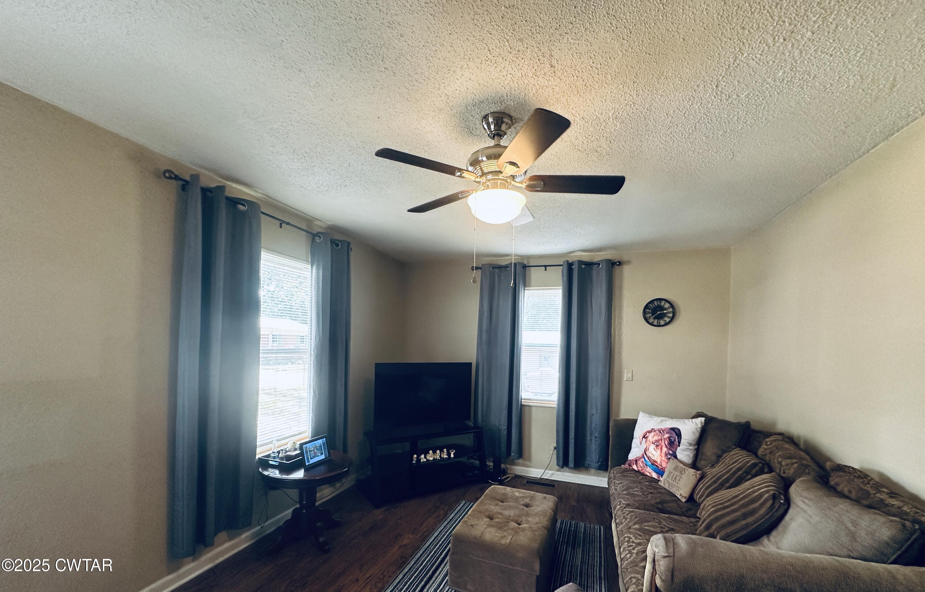 112 Fox Street Rutherford, TN 38369 - Photo 8 of 14 a living room with furniture and wooden floor
