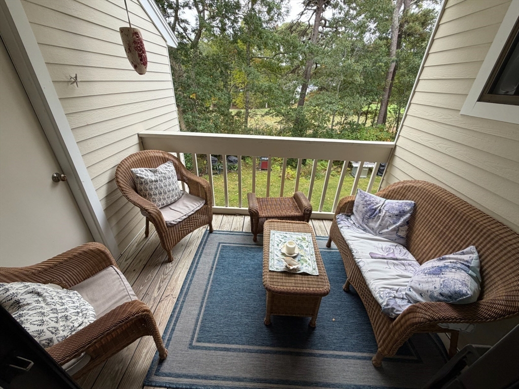 150 Eaton Lane, Unit 150 Brewster, MA 02631 - Photo 15 of 20 a outdoor living room with furniture