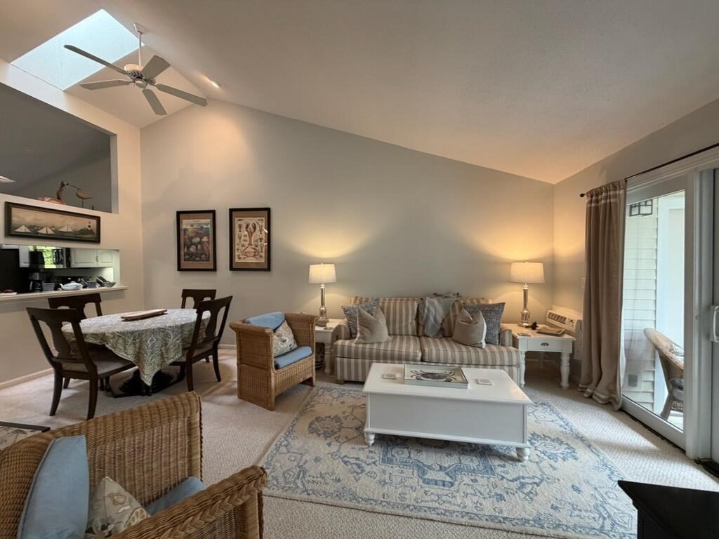 150 Eaton Lane, Unit 150 Brewster, MA 02631 - Photo 3 of 20 a living room with furniture and a flat screen tv