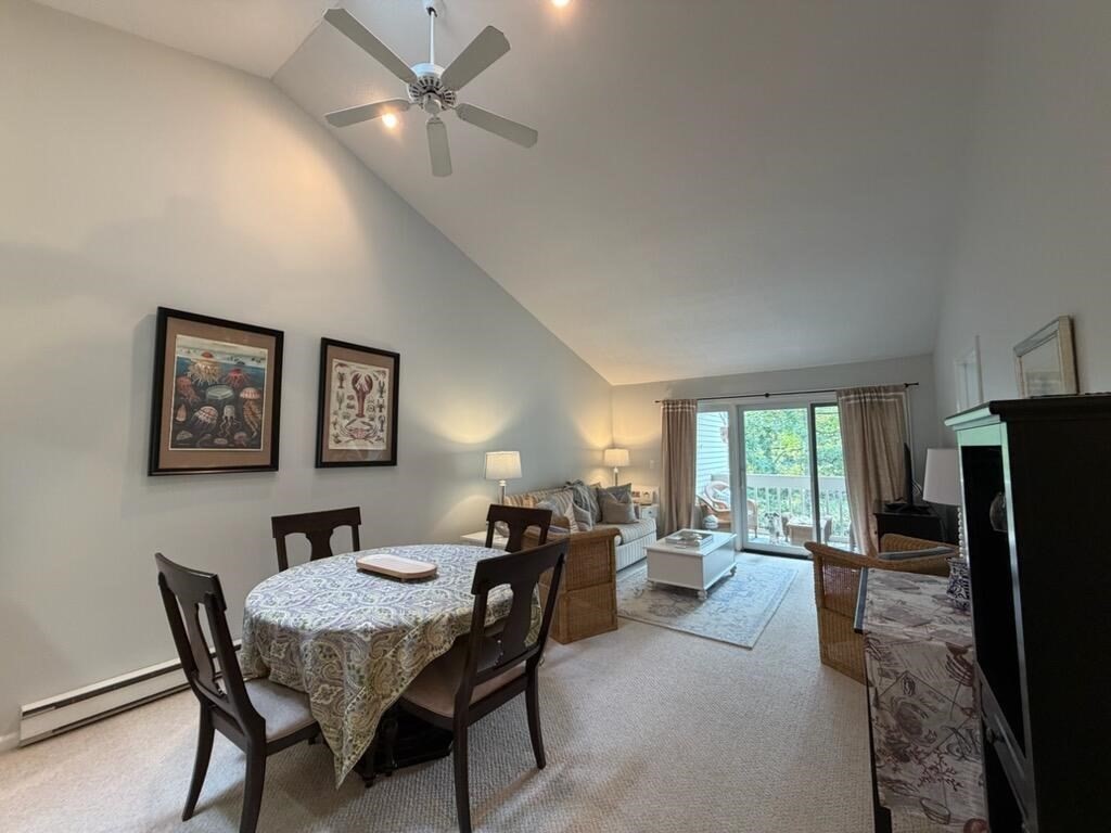 150 Eaton Lane, Unit 150 Brewster, MA 02631 - Photo 5 of 20 a dining room with furniture and window