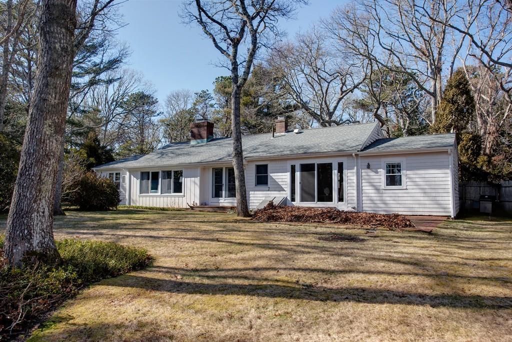 195 Crystal Lake Road Osterville, MA 02655 - Photo 24 of 36 a front view of a house with garden