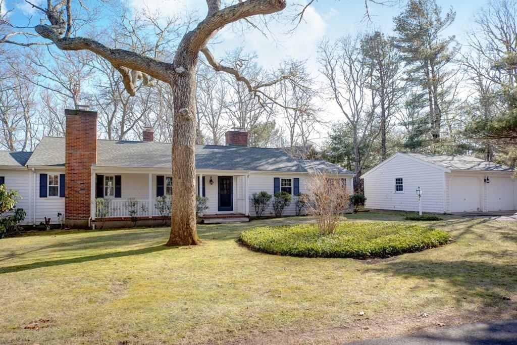 195 Crystal Lake Road Osterville, MA 02655 - Photo 29 of 36 a view of a house with a yard covered in snow