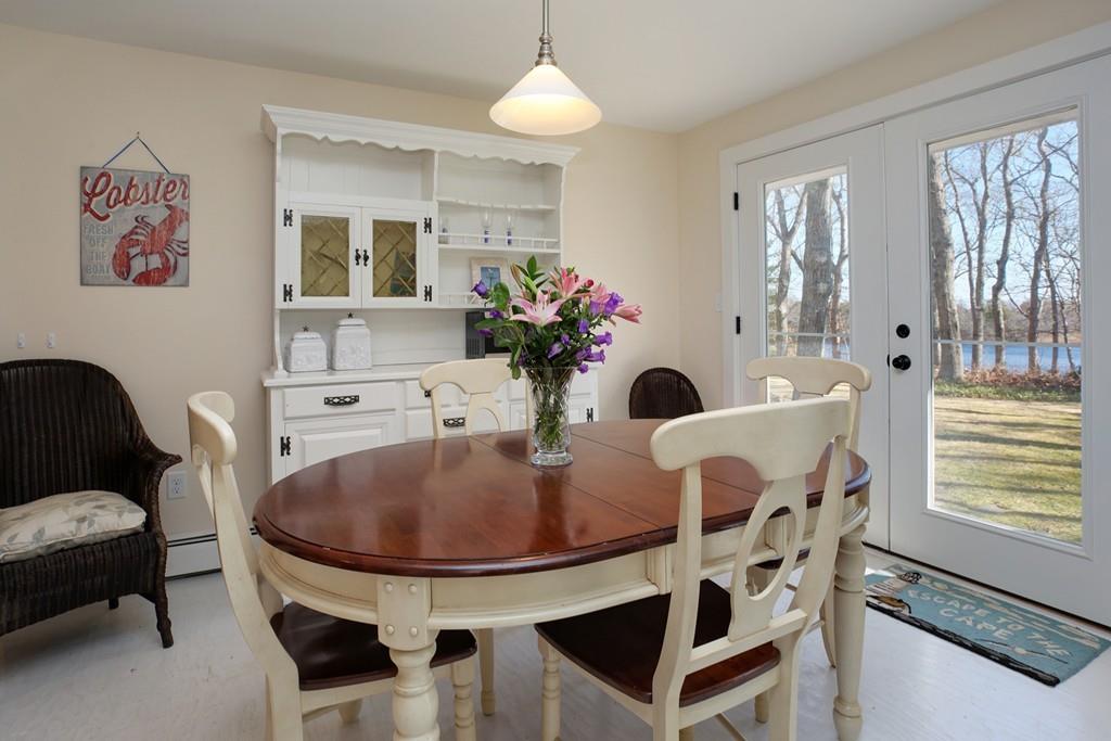 195 Crystal Lake Road Osterville, MA 02655 - Photo 10 of 36 a dining room with furniture and window