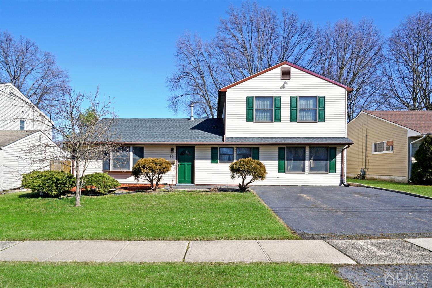 83 Winthrop Road Edison, NJ 08817 - Photo 1 of 36 a front view of a house with a yard