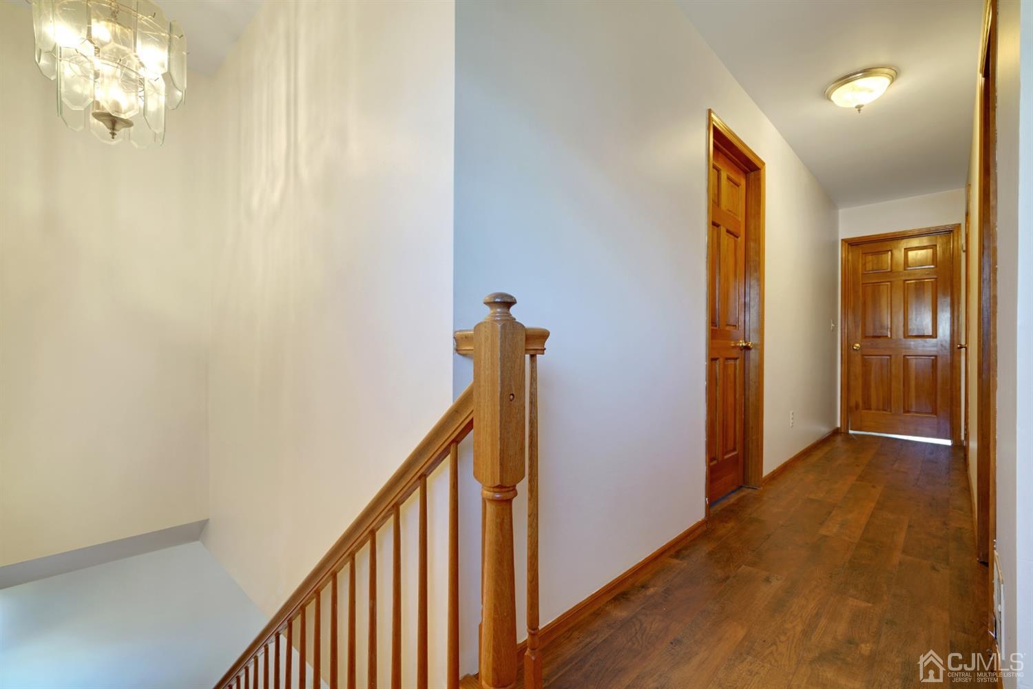 83 Winthrop Road Edison, NJ 08817 - Photo 33 of 36 a view of a hallway with painted walls