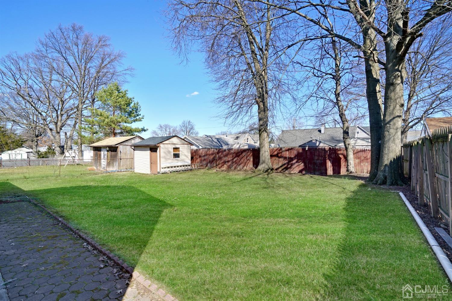 83 Winthrop Road Edison, NJ 08817 - Photo 6 of 36 a view of a house with a backyard