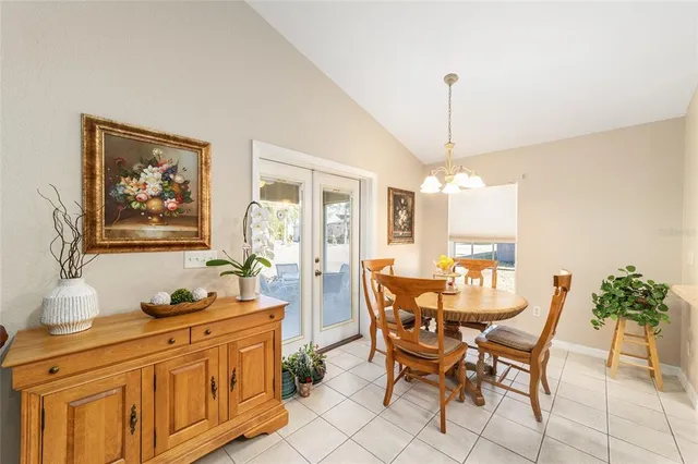 a bedroom with furniture and a flat screen tv