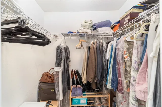 a bathroom with a sink toilet and a mirror