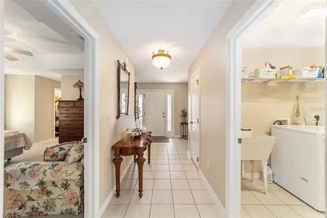 a living room with fireplace furniture and a flat screen tv