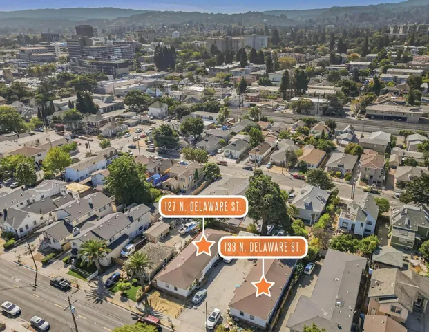 an aerial view of a house with a outdoor space