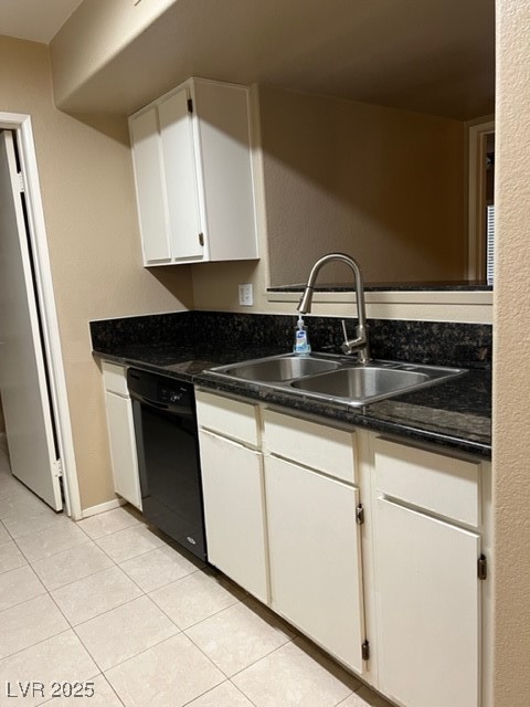 7885 West Flamingo Road, Unit 1064 Las Vegas, NV 89147 - Photo 5 of 19 Kitchen featuring a sink, light tile patterned floors, white cabinets, and dishwashing machine