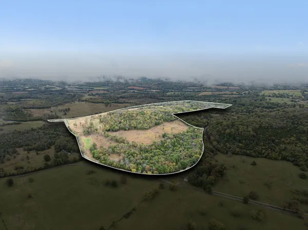 view of roof with small space