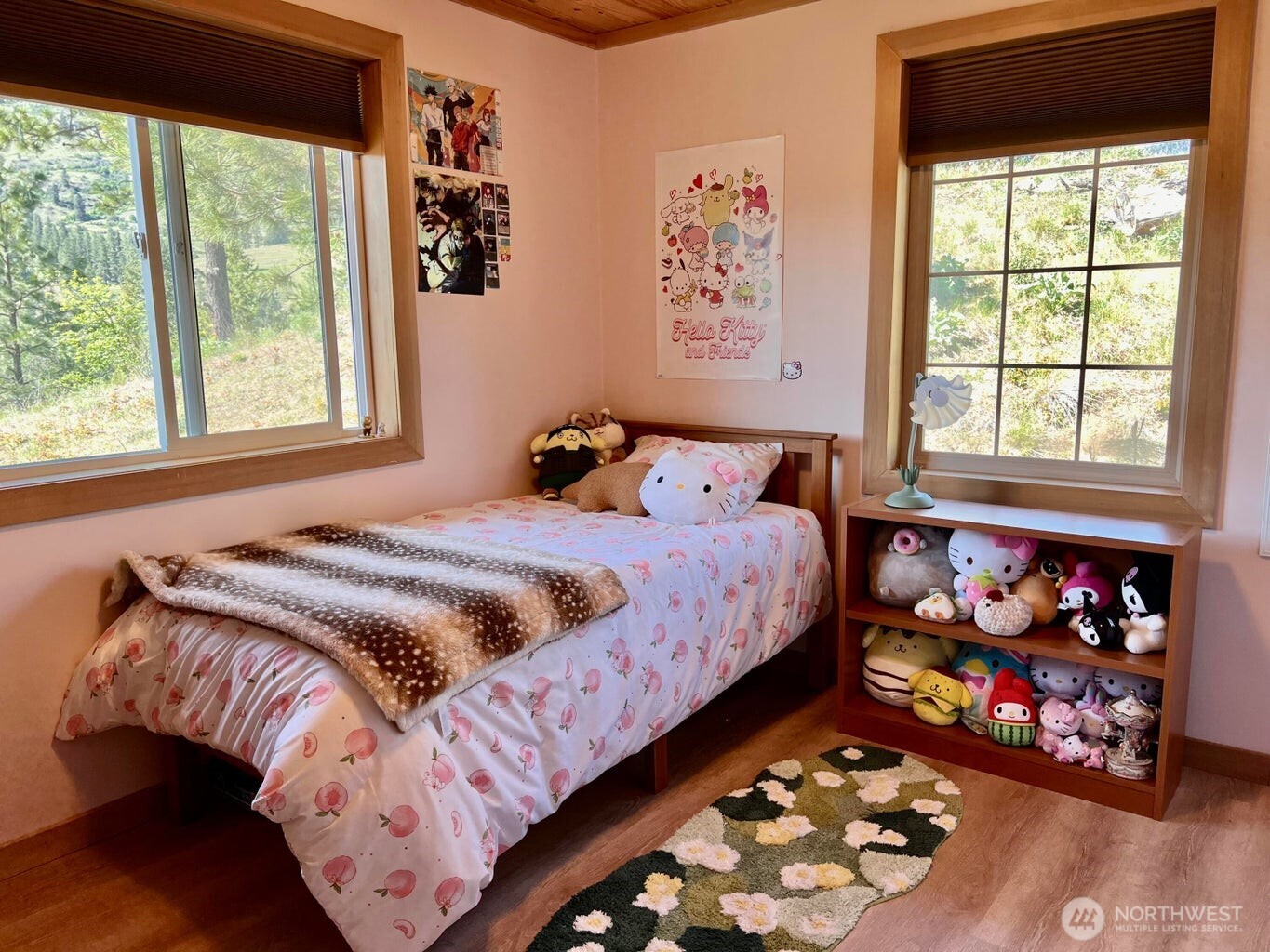 3705 Hope Way Kettle Falls, WA 99141 - Photo 24 of 37 a bedroom with a bed and a window in it