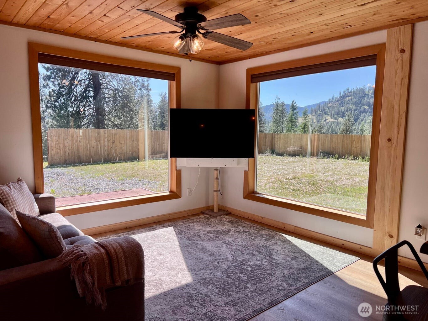 3705 Hope Way Kettle Falls, WA 99141 - Photo 33 of 37 a living room with furniture and a flat screen tv