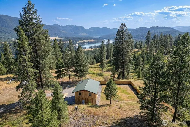 a view of a town with mountains in the background