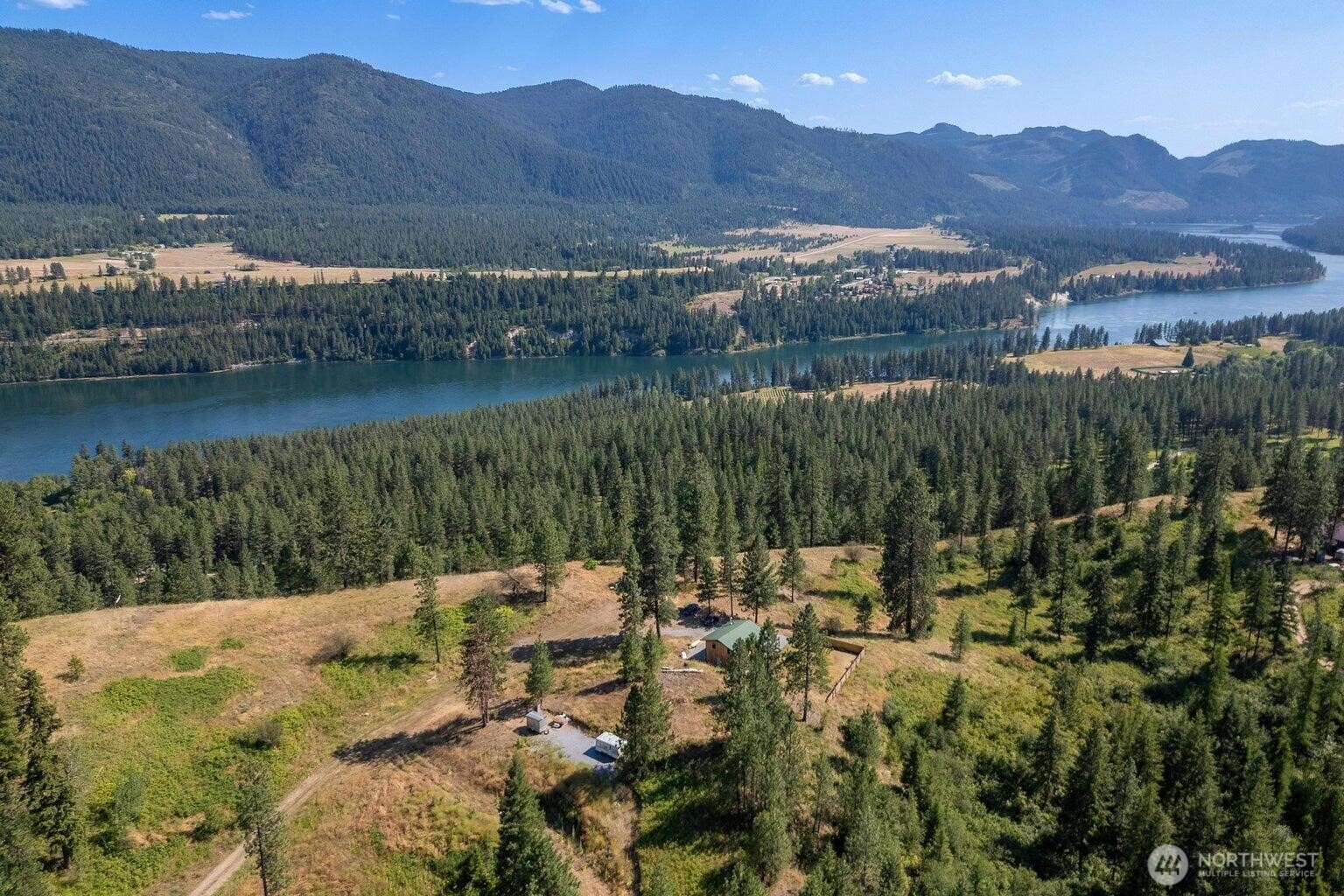 3705 Hope Way Kettle Falls, WA 99141 - Photo 7 of 37 a view of lake with mountain