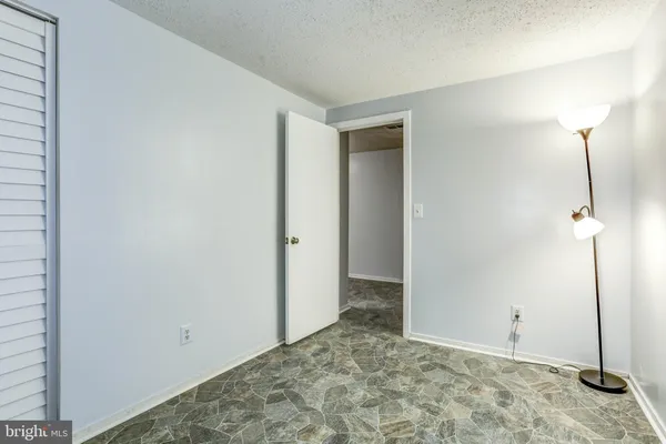 a view of a room with a hallway