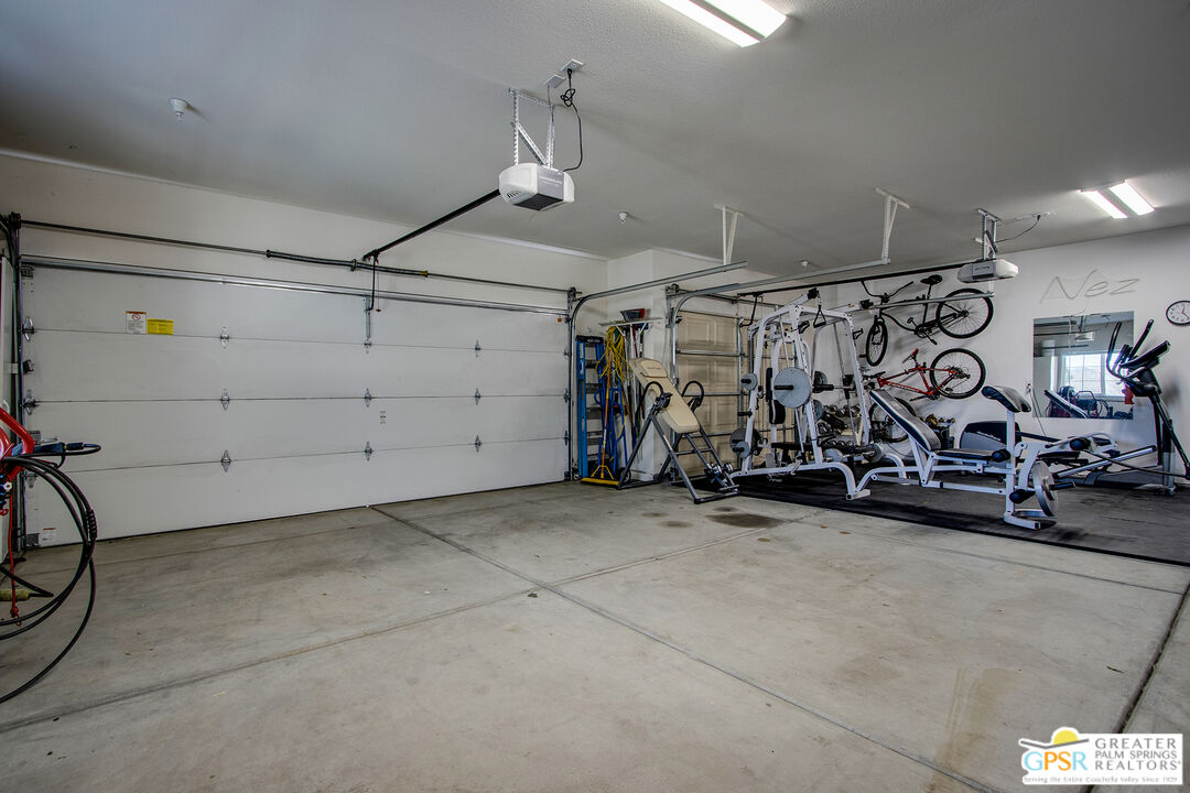 56166 Nez Perce Trail Yucca Valley, CA 92284 - Photo 33 of 54 a view of a garage with storage