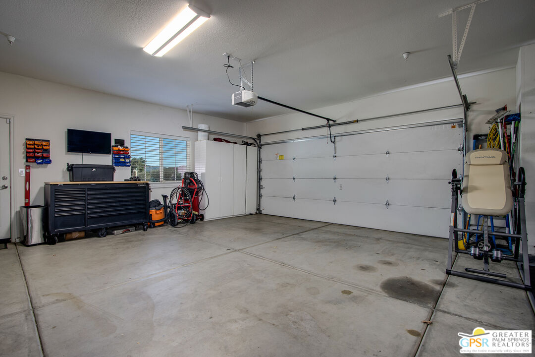 56166 Nez Perce Trail Yucca Valley, CA 92284 - Photo 34 of 54 a view of a garage room