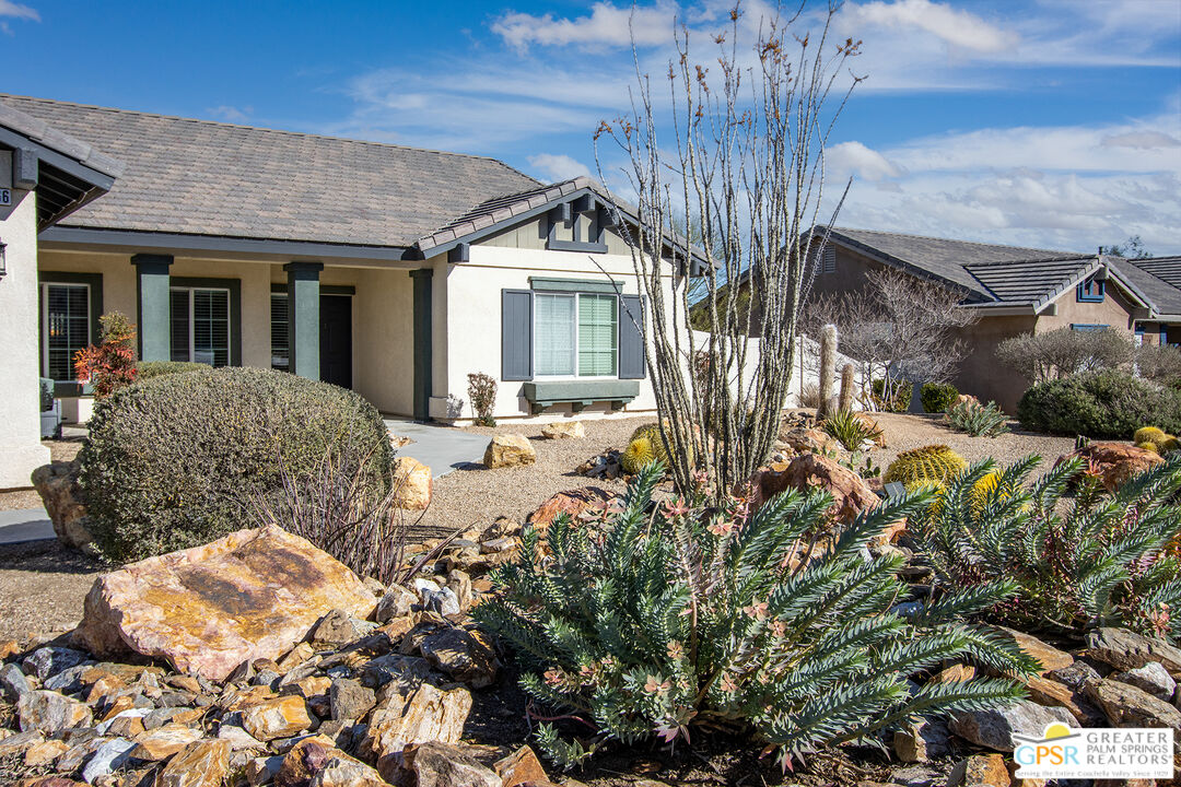 56166 Nez Perce Trail Yucca Valley, CA 92284 - Photo 51 of 54 a house view with a outdoor space