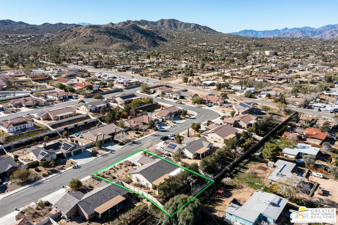 56166 Nez Perce Trail Yucca Valley, CA 92284 - Photo 53 of 54 an aerial view of residential houses with outdoor space