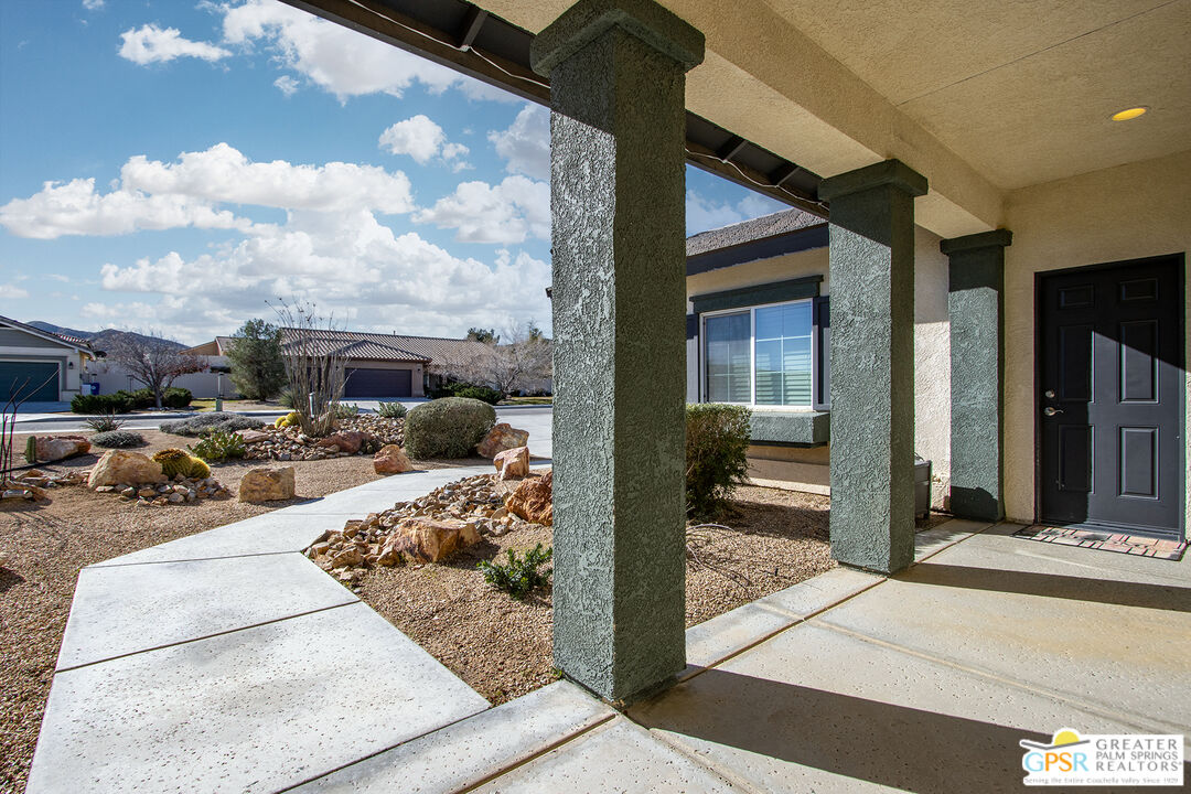 56166 Nez Perce Trail Yucca Valley, CA 92284 - Photo 6 of 54 a view of a porch with furniture